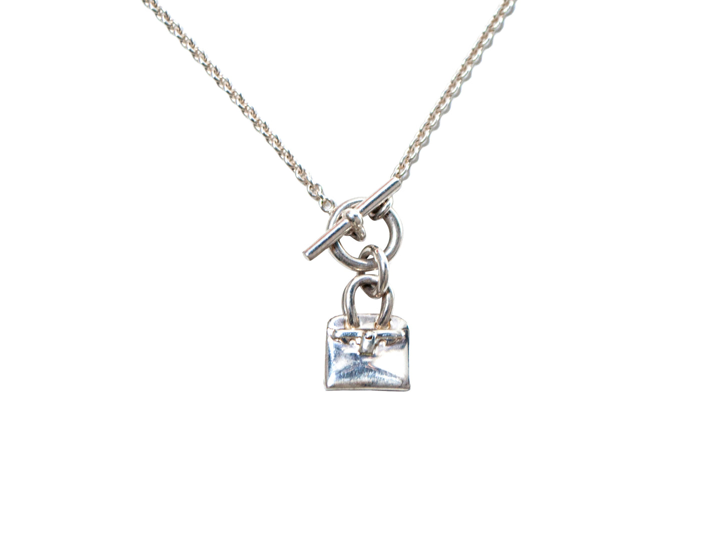 Hermes Silver Pendant